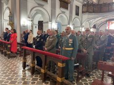 Los asistentes a la Eucaristía en la iglesia de Santa Cecilia // Paloma González